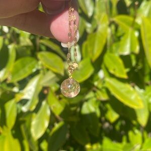 Pink rutile sphere pendant with 18k bale